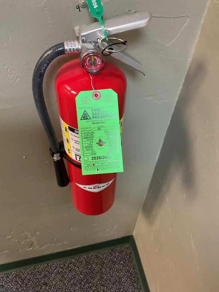 Amerex fire extinguisher with official NFPA 10 green certification tag in Rio Rancho